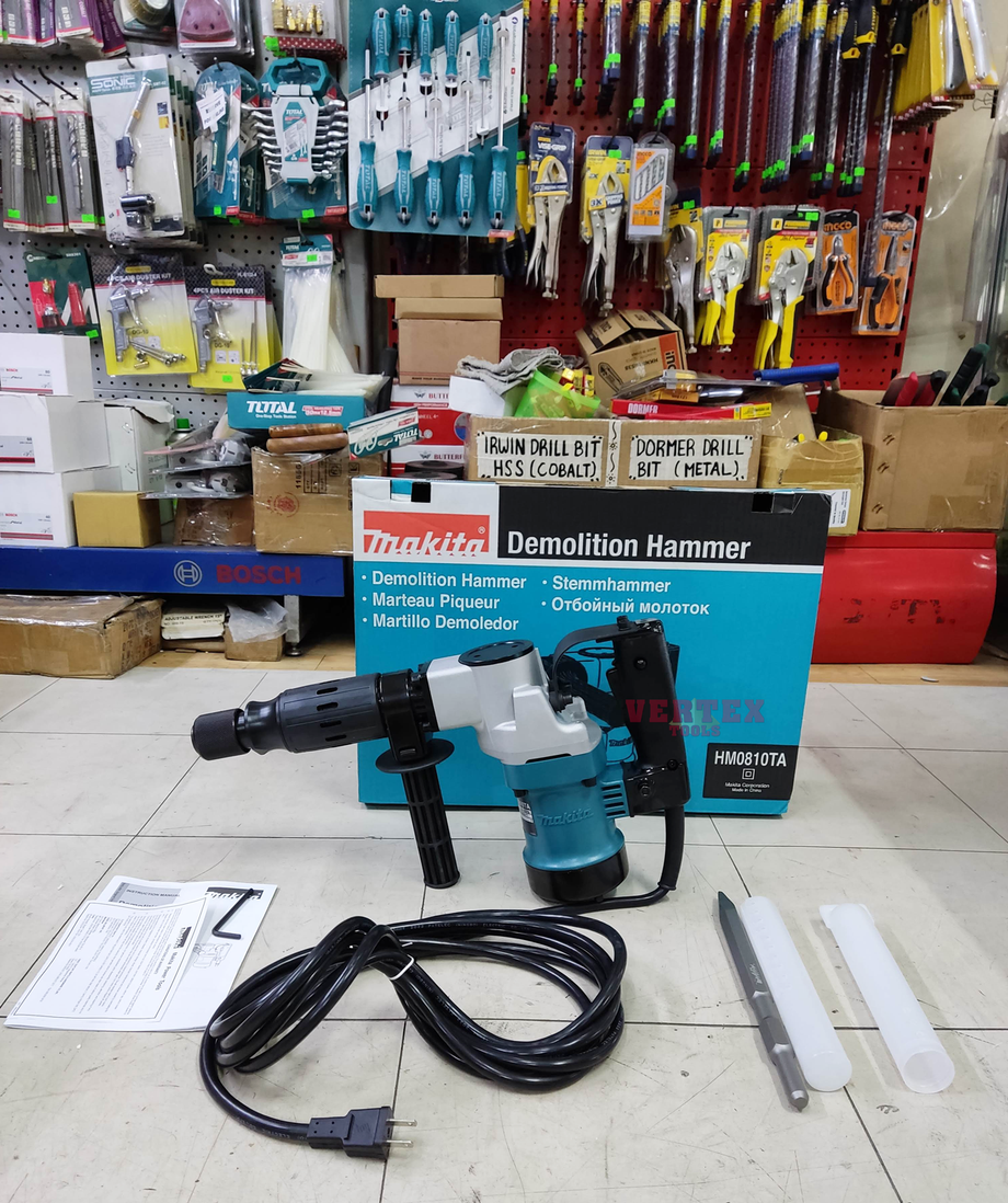 Chip top hammer drill